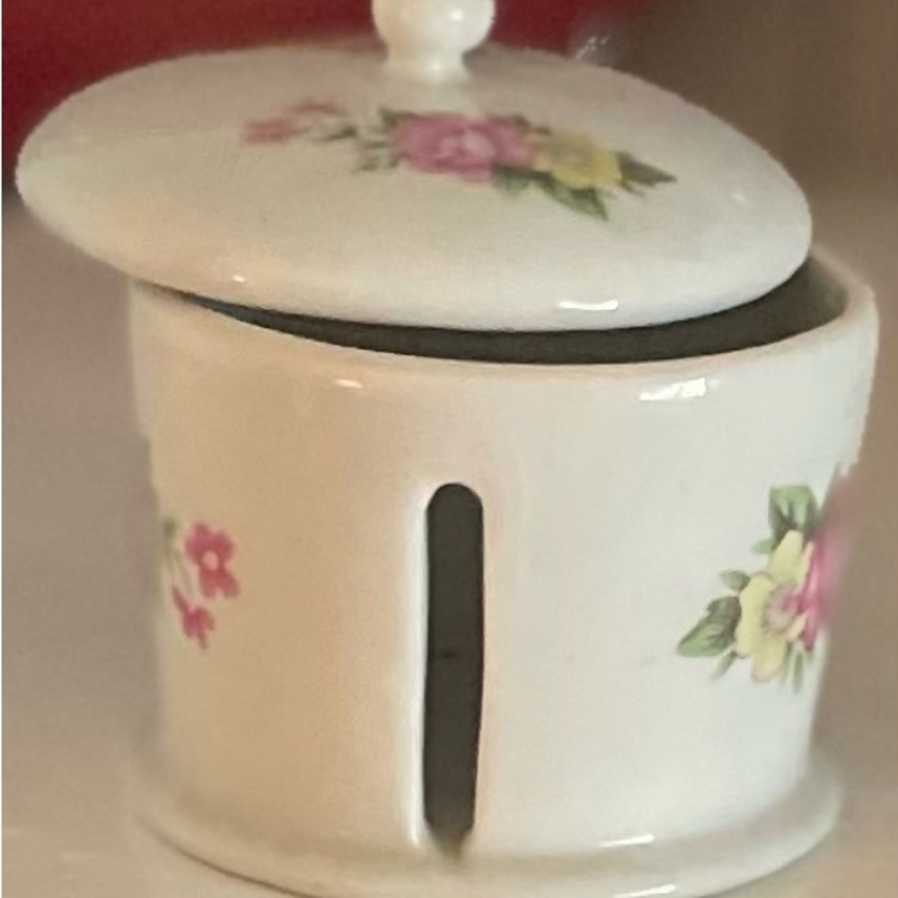 Rolled Postal Stamps Dispenser. Floral desk stamp dispenser. No damage.